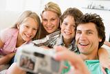 Family taking self portrait with digital camera