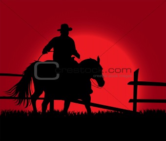 Cowboy over sunset