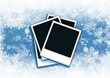 Polaroids on snowflake background