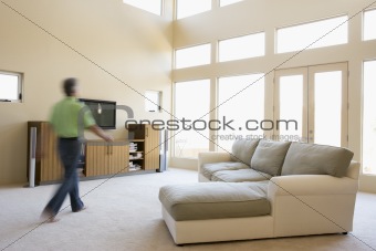 Man walking through living room