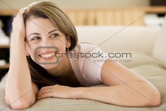 Woman lying in living room