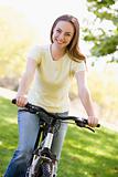 Woman on bicycle smiling