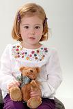 cute blonde toddler with teddy