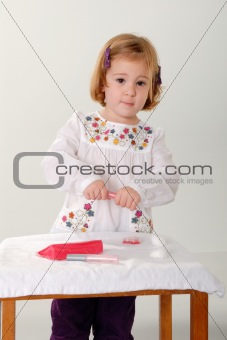 pretty blonde toddler playing