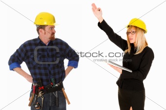 quarreling between angry businesswoman and construction worker 
