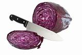 sliced red cabbage and a knife on white background