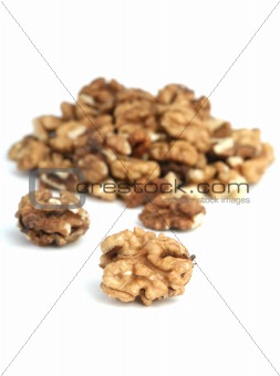 Heart made of nuts of almonds on a white background
