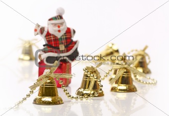 Santa over gift box with christmas bells