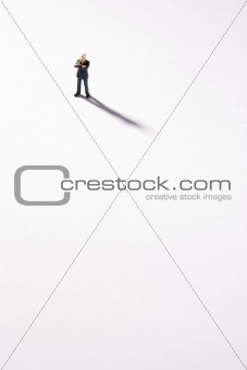 Figurine Of Businessman With Arms Crossed