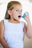 Girl Using An Inhaler