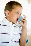 Boy Using An Inhaler