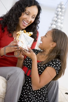 Mother Giving Daughter Her Christmas Present