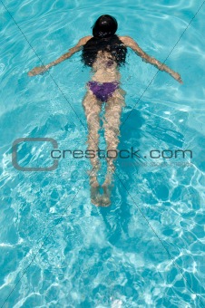 girl swimming at the pool