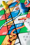 Close -Up Of Snakes And Ladders Board 