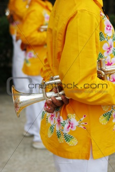Close-up of a boy holding a trumpet