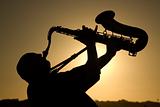 saxophonist at dusk 2
