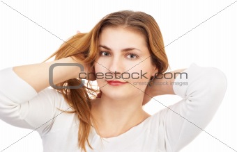 young pretty blond girl playing with hair