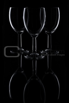 Three glasses on black