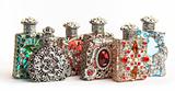 Five perfume bottles