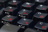black keyboard with red cyrillic letters, closeup, macro.