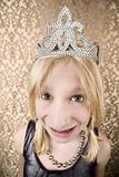 Pretty young girl with a tiara with braces