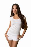 Young ethnic woman in white t-shirt and shorts