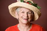 Senior woman in a straw hat