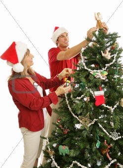 Son Helps Mom Decorate Christmas Tree