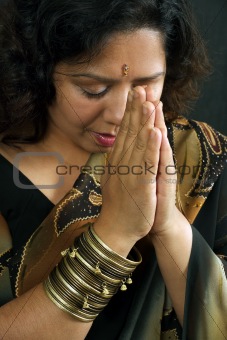 Indian woman praying
