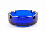 Empty transparent dark blue ashtray
