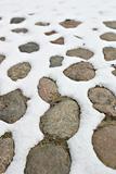 Cobble stones with snow