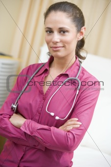 A Doctor Standing In A Hospital Ward