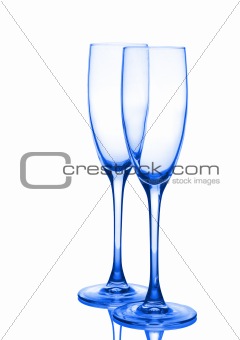 Two dark blue glasses for champagne. Isolated on a white background.