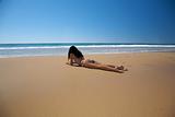 bikini woman lie down on the sand