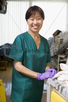 An Orderly Cleaning A Hospital Ward
