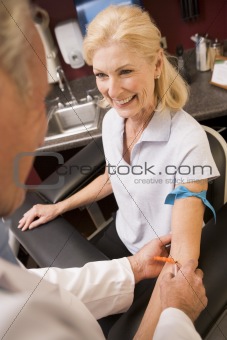 Middle Aged Woman Having Blood Test Done