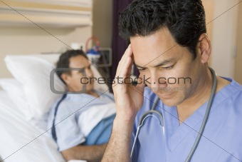 Doctor Looking Frustrated In Patients Room