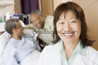 Nurse Smiling In Hospital Room