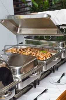 chafing dish heater with fish kebab