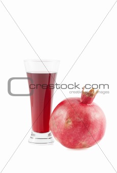 Glass of garnet juice and pomegranate fruit. Over White.
