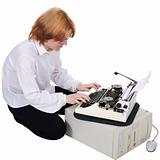 Girl printing on an typewriter