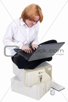 Girl working on the laptop on a white