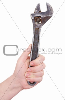 Big wrench in a hand