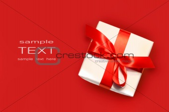 Little red gift isolated on white