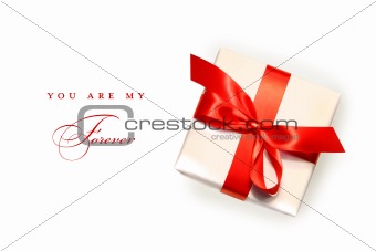 Little red gift isolated on white