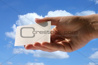 hand holding blank business card 