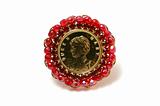 Red brooch with queen