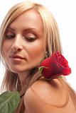Blond female with red rose