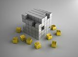 Crumbling gold and silver cubes