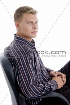 handsome businessman relaxing on chair